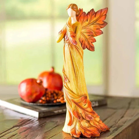 Statuetta decorativa angelica con ali a forma di foglie d'acero autunnali