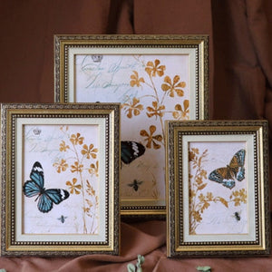 Cornici portafoto con motivi floreali e animali
