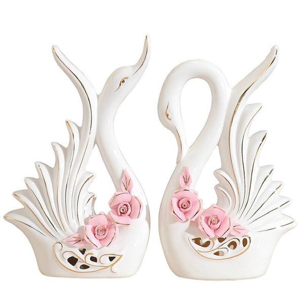 Originalissima decorazione con coppia di cigni in ceramica e con rose