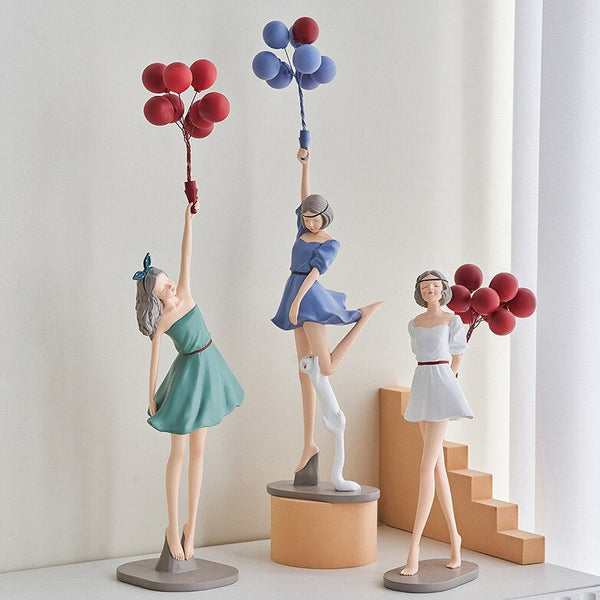 Statuette decorative di ragazze con palloncini