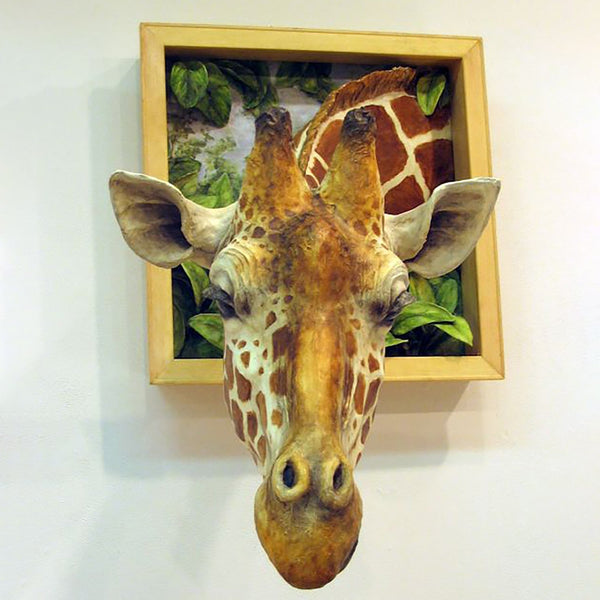 Decorazione a forma di testa di animale in 3D che esce dal muro