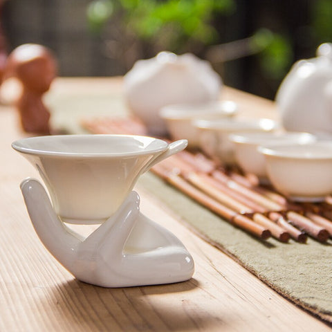 Set da tè in ceramica “mano di Buddha Guanyin